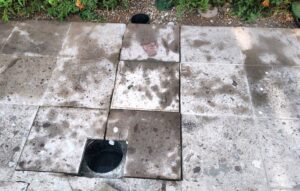 Wet spots indicate a leak.